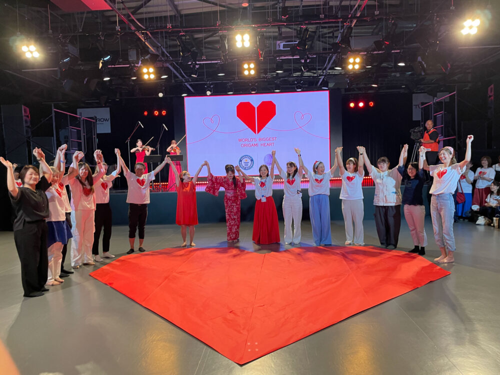 JANAT Paris, Maison Kayser and Femmes du Monde foundation volunteers to craft the Worlds largest Origami Heart at Expo 2025 Osaka